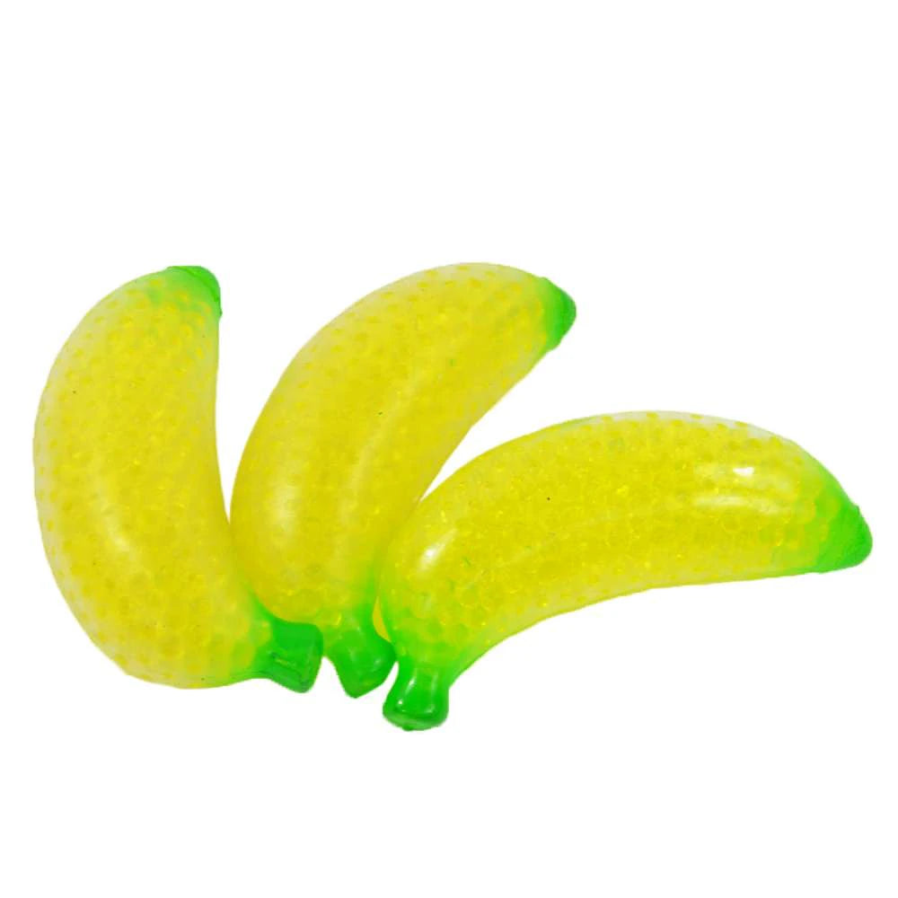 Flutschi-Ball Banana – squishy banan med vattenpärlor 13 cm