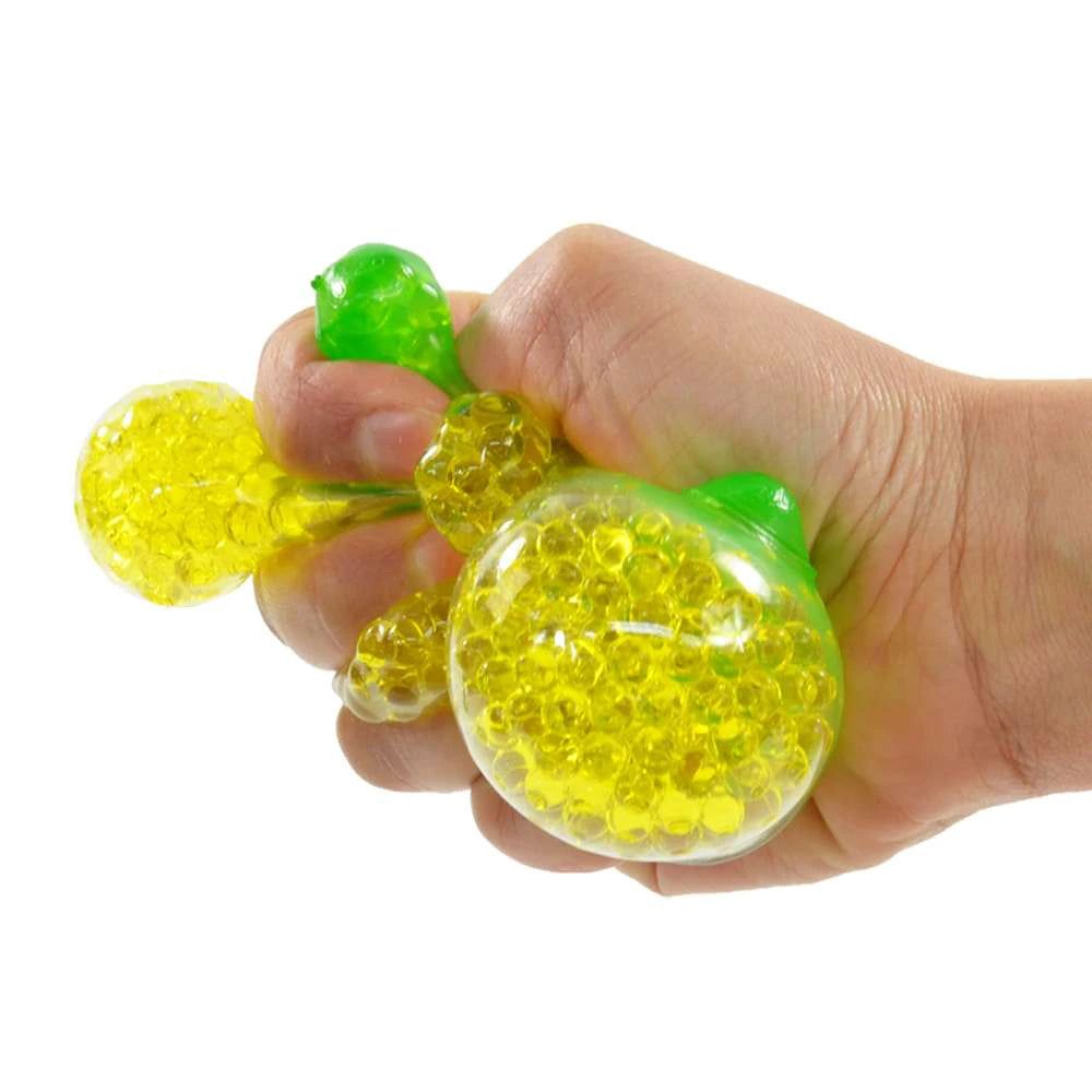 Flutschi-Ball Banana – squishy banan med vattenpärlor 13 cm